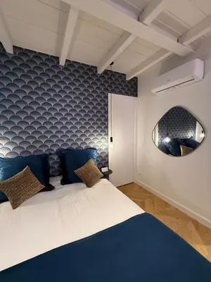 Letto o letti in una camera di Riviera Luxe Glam