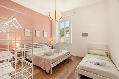 Letto o letti in una camera di La Casa Accanto