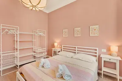 Letto o letti in una camera di La Casa Accanto