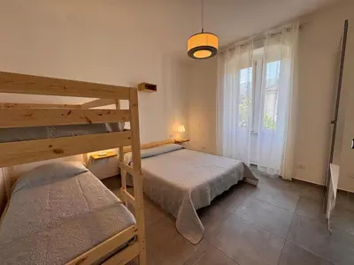 Letto o letti in una camera di Pedali di Liguria