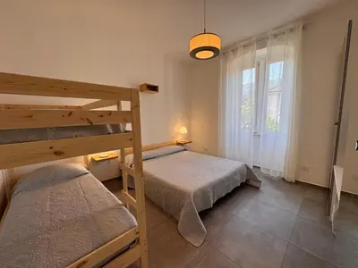 Letto o letti in una camera di Pedali di Liguria