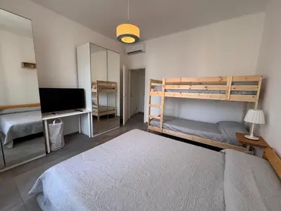 Letto o letti in una camera di Pedali di Liguria