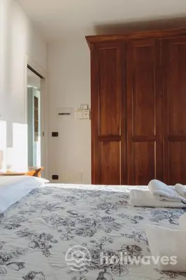 Letto o letti in una camera di La casa di Maurizio