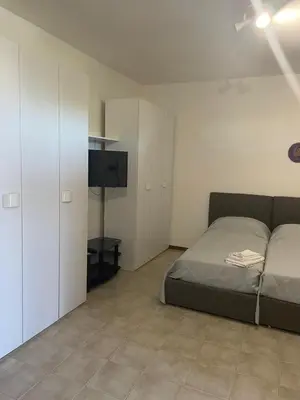 Letto o letti in una camera di Ami Affittacamere 2
