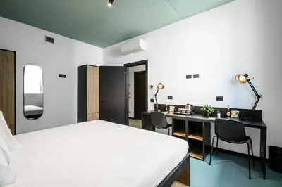 Letto o letti in una camera di CX Modena Crocetta