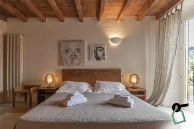 Letto o letti in una camera di Hotiday Vezzano Ligure