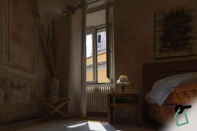 Letto o letti in una camera di Hotiday Vezzano Ligure