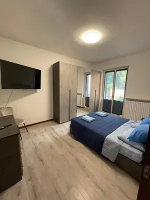 Letto o letti in una camera di Appartamento EM