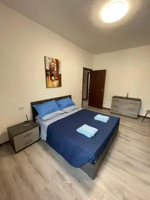 Letto o letti in una camera di Appartamento EM