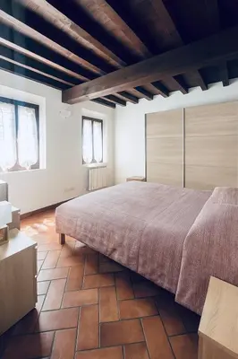 Letto o letti in una camera di Appartamento Piazza Castello