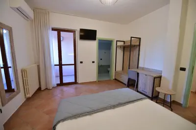 Letto o letti in una camera di Hotel Vignale