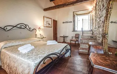 Letto o letti in una camera di Torre De' Medici - Near Five Land - Pool - Tuscany