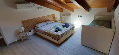 Letto o letti in una camera di Sofia e Ninì holiday house