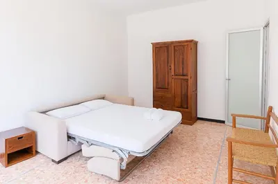 Letto o letti in una camera di Xenia - 2rooms apt in Salita Sant'Agostino 15