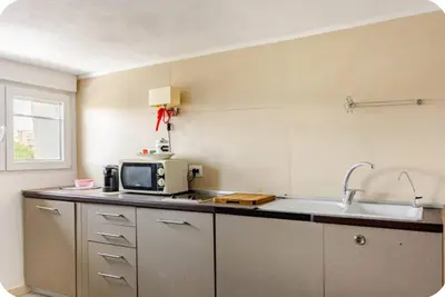 Cucina o angolo cottura di Accogliente monolocale