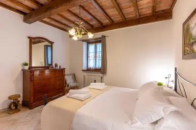 Letto o letti in una camera di Villa Soli - Casa in Pietra con Piscina Panoramica