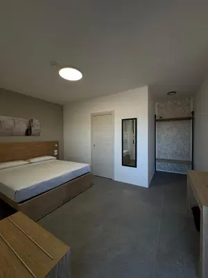 Letto o letti in una camera di Dormi-RE 2