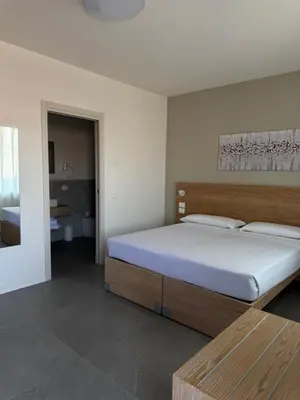 Letto o letti in una camera di Dormi-RE 2