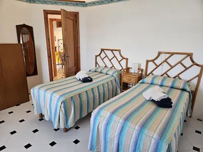 Letto o letti in una camera di Villa Onde e Ulivi