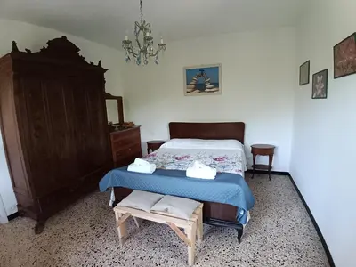 Letto o letti in una camera di Villetta Montallegro Rapallo