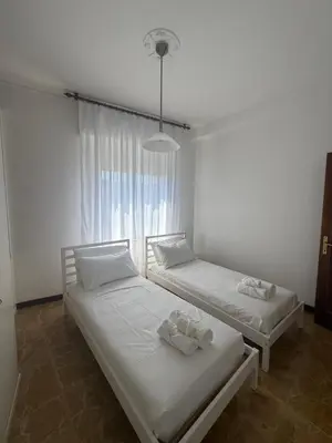 Letto o letti in una camera di Onde Blu