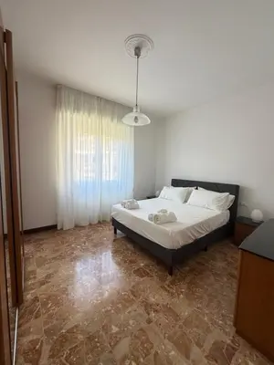 Letto o letti in una camera di Onde Blu