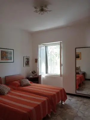 Letto o letti in una camera di Roses House