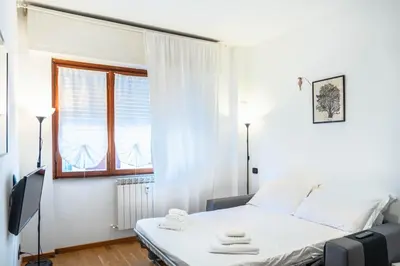 Letto o letti in una camera di Beaches, Sea, and Montallegro Panoramic Cable Car