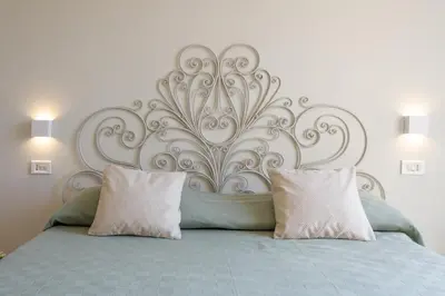 Letto o letti in una camera di Views on Ghirlandina in the heart of MotorValley