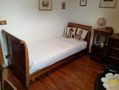 Letto o letti in una camera di Belle Arti - Affitti Brevi Italia