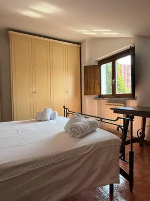 Letto o letti in una camera di Mansarda Lucia