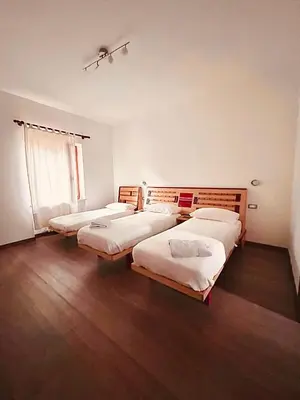 Letto o letti in una camera di Il Cortile Agriturismo