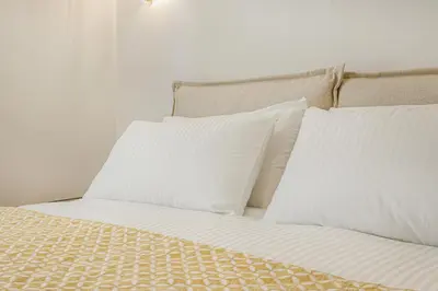 Letto o letti in una camera di Dimora d'Autore - Charm in the Heart of Modena