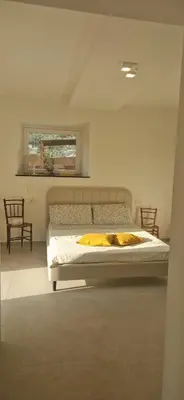 Letto o letti in una camera di Villa Razeto