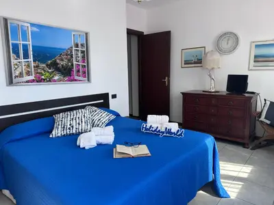 Letto o letti in una camera di AMare Blu by Holiday World