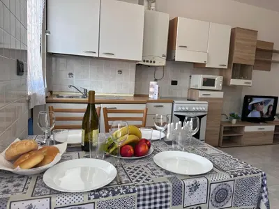 Cucina o angolo cottura di AMare Blu by Holiday World