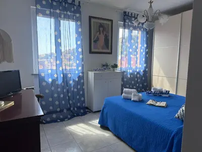 Letto o letti in una camera di AMare Blu by Holiday World