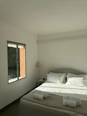 Letto o letti in una camera di Arazzo Apartments