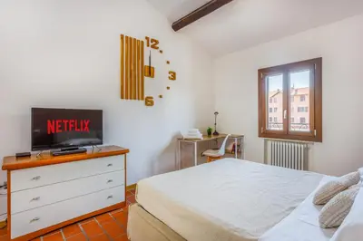 Letto o letti in una camera di Little Cottage near Ferrari's City