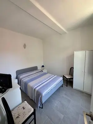 Letto o letti in una camera di Brezza di Mare 25