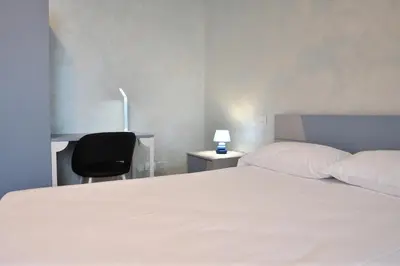 Letto o letti in una camera di Palazzo Cavalieri Business&Relax 12Tristano
