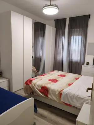 Letto o letti in una camera di Casa ALFRED FIDENZA