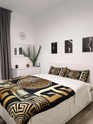 Letto o letti in una camera di Casa ALFRED FIDENZA