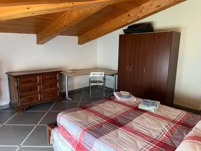 Letto o letti in una camera di Appartamento via Giorgio Canale 72