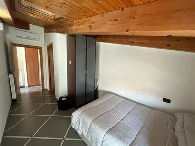 Letto o letti in una camera di Appartamento via Giorgio Canale 72