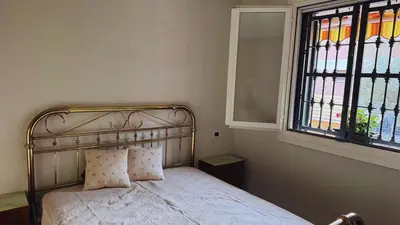 Letto o letti in una camera di Appartamento Olivo - with garden