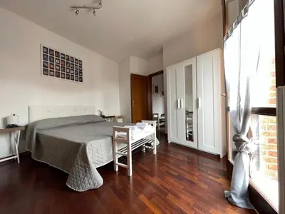 Letto o letti in una camera di Soliera 105 - Appartamento su due livelli in zona tranquilla
