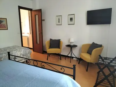 TV o dispositivi per l'intrattenimento presso Gianlu Cosy Apartment with AC