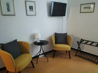 TV o dispositivi per l'intrattenimento presso Gianlu Cosy Apartment with AC