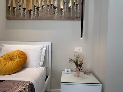 Letto o letti in una camera di Salotto Santa Franca